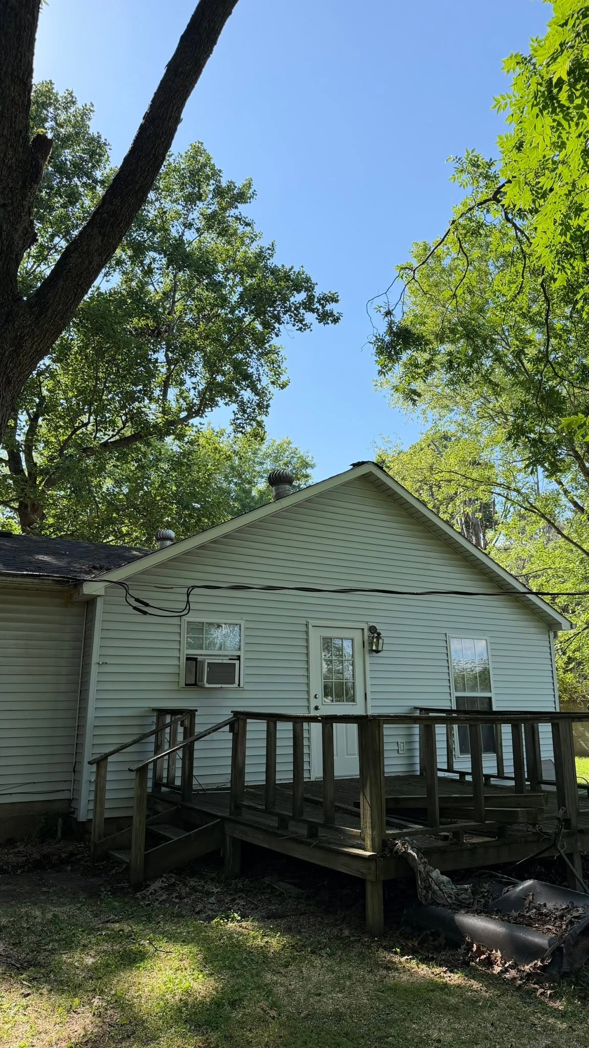 After storm limb removal cleared from a Martin TN home roof